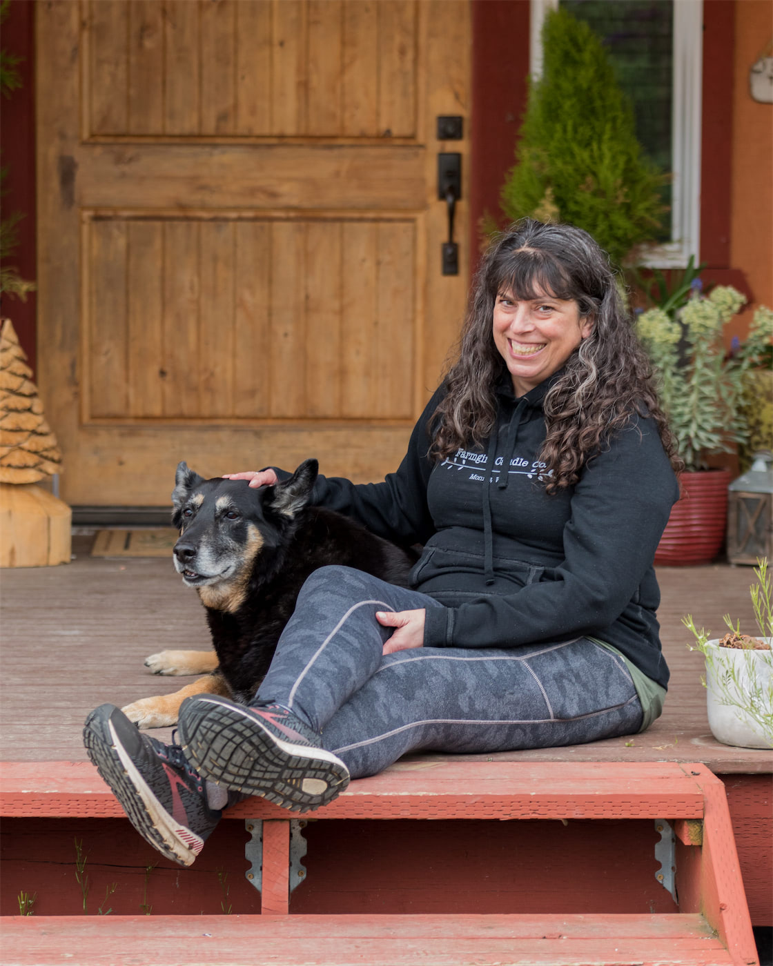 theresa on porch with ruger